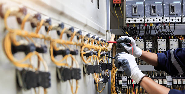 Professional Electrical Panel Upgrade technician working in Titus County County, TX